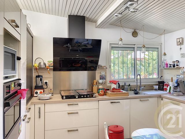 Afficher la photo en grand Appartement F4 à vendre - 4 pièces - 110.72 m2 - PERPIGNAN - 66 - LANGUEDOC-ROUSSILLON - Century 21 Terres Catalanes