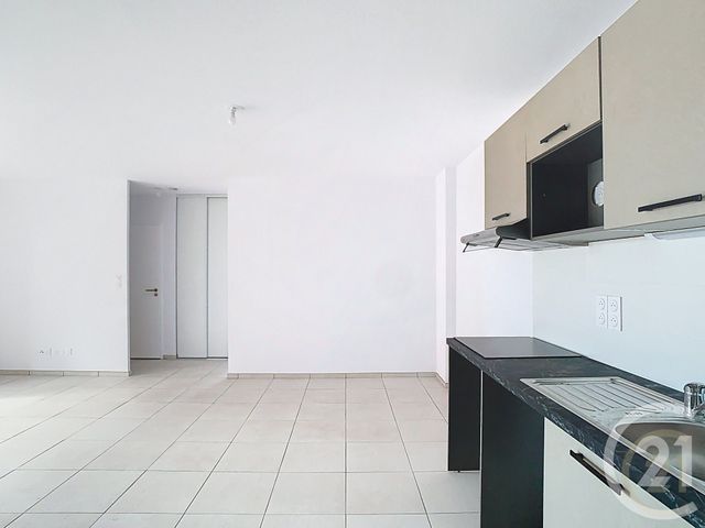 Afficher la photo en grand Appartement F3 à vendre - 3 pièces - 62.55 m2 - POLLESTRES - 66 - LANGUEDOC-ROUSSILLON - Century 21 Terres Catalanes