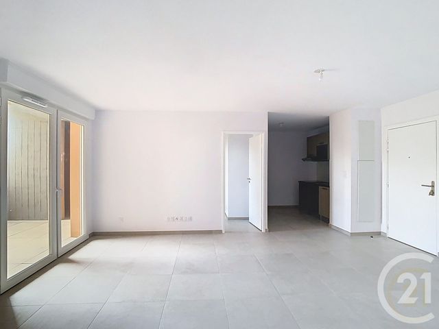Afficher la photo en grand Appartement F3 à vendre - 3 pièces - 60.49 m2 - POLLESTRES - 66 - LANGUEDOC-ROUSSILLON - Century 21 Terres Catalanes
