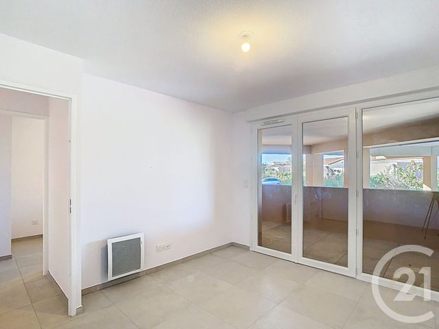 Afficher la photo en grand Appartement F3 à vendre - 3 pièces - 76.62 m2 - POLLESTRES - 66 - LANGUEDOC-ROUSSILLON - Century 21 Terres Catalanes