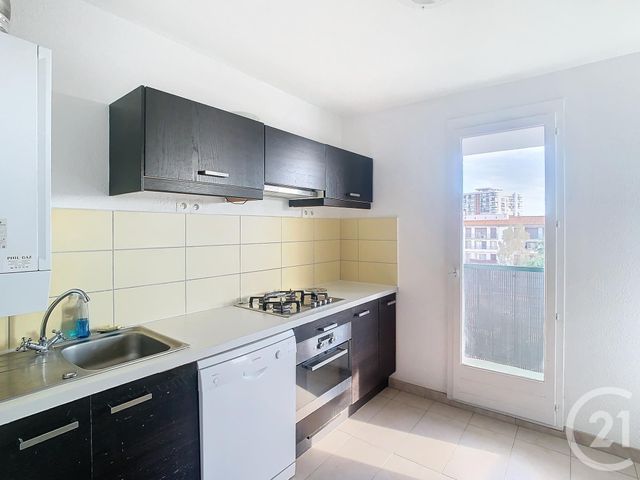 Appartement T2 à louer - 2 pièces - 53.32 m2 - PERPIGNAN - 66 - LANGUEDOC-ROUSSILLON - Century 21 Terres Catalanes